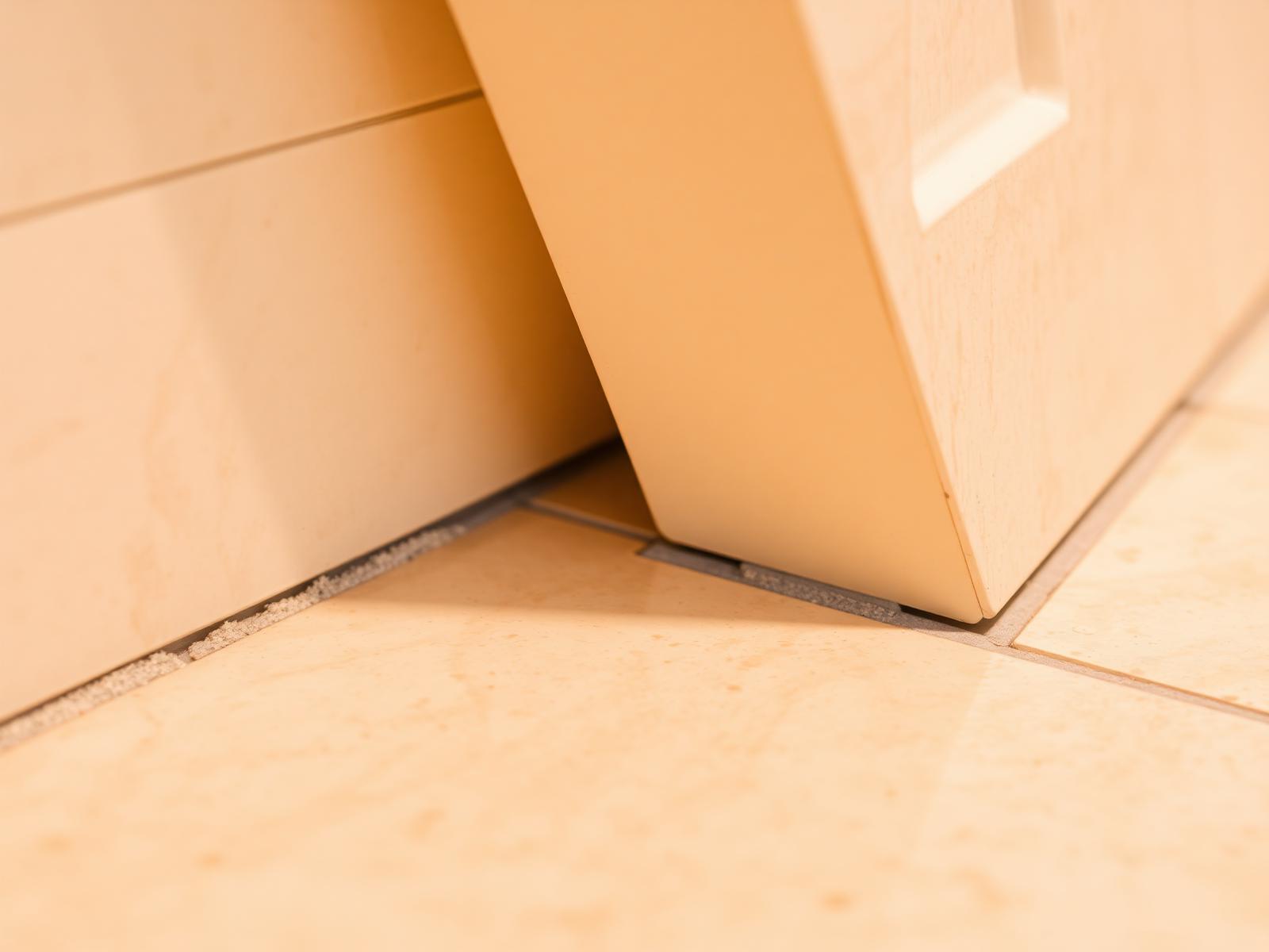 Cracked tile replacement with matched material.
